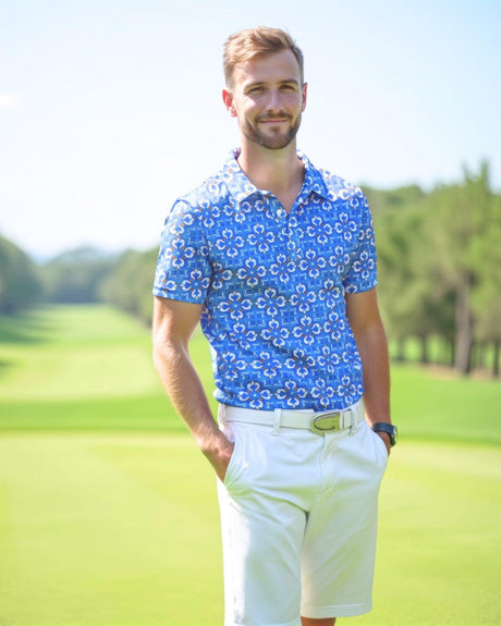 Man wearing a blue patterned golf polo shirt on a golf course