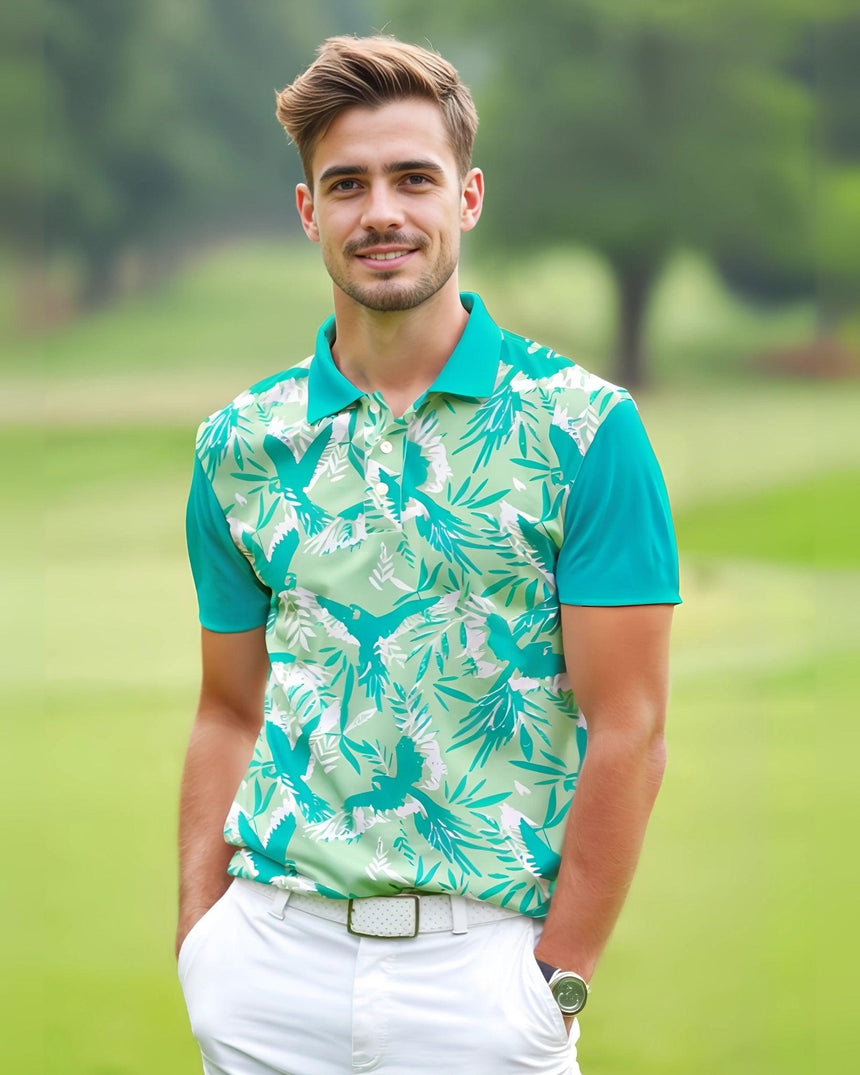 Man wearing a green and blue tropical print golf polo shirt on a golf course