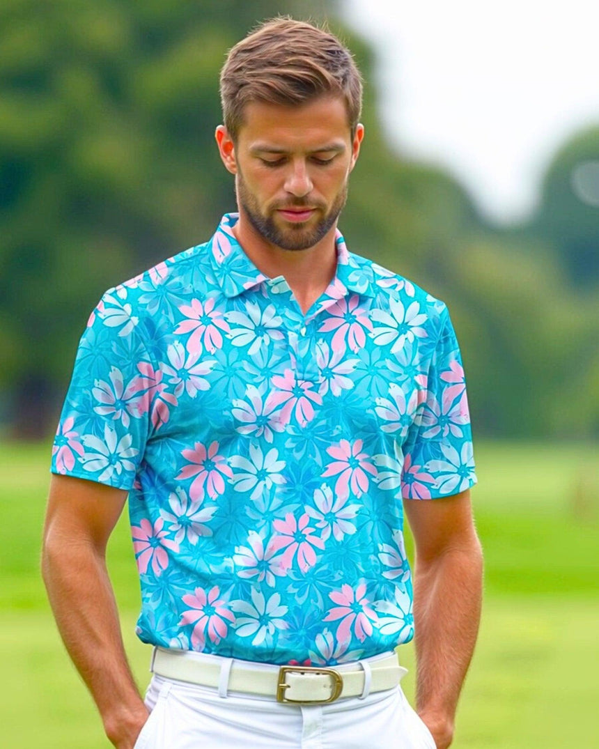 Man wearing a blue and pink floral golf polo shirt on a golf course