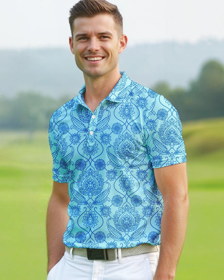 A man on a golf course wearing a blue floral print golf polo shirt