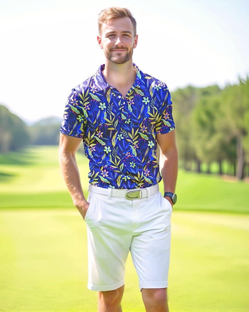 Man wearing a blue floral shirt and white shorts on a golf course