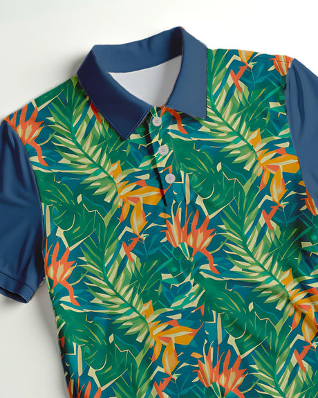 Close up of a colorful tropical print polo shirt with blue collar