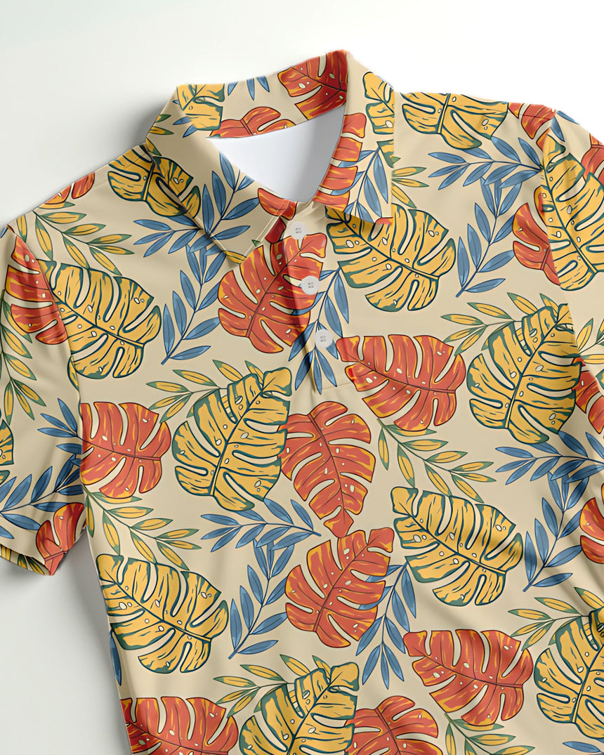 Close up of a colorful tropical leaf print golf polo