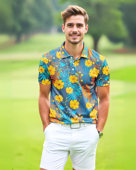 Man wearing a colorful floral golf polo shirt and white pants standing on a golf course