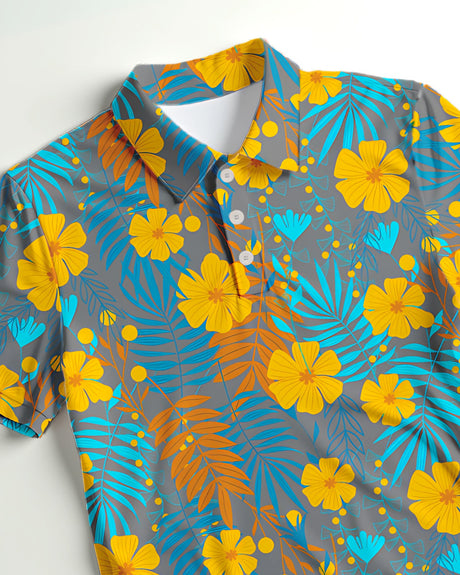 Hawaiian polo shirt with yellow flowers and blue leaves on a gray background