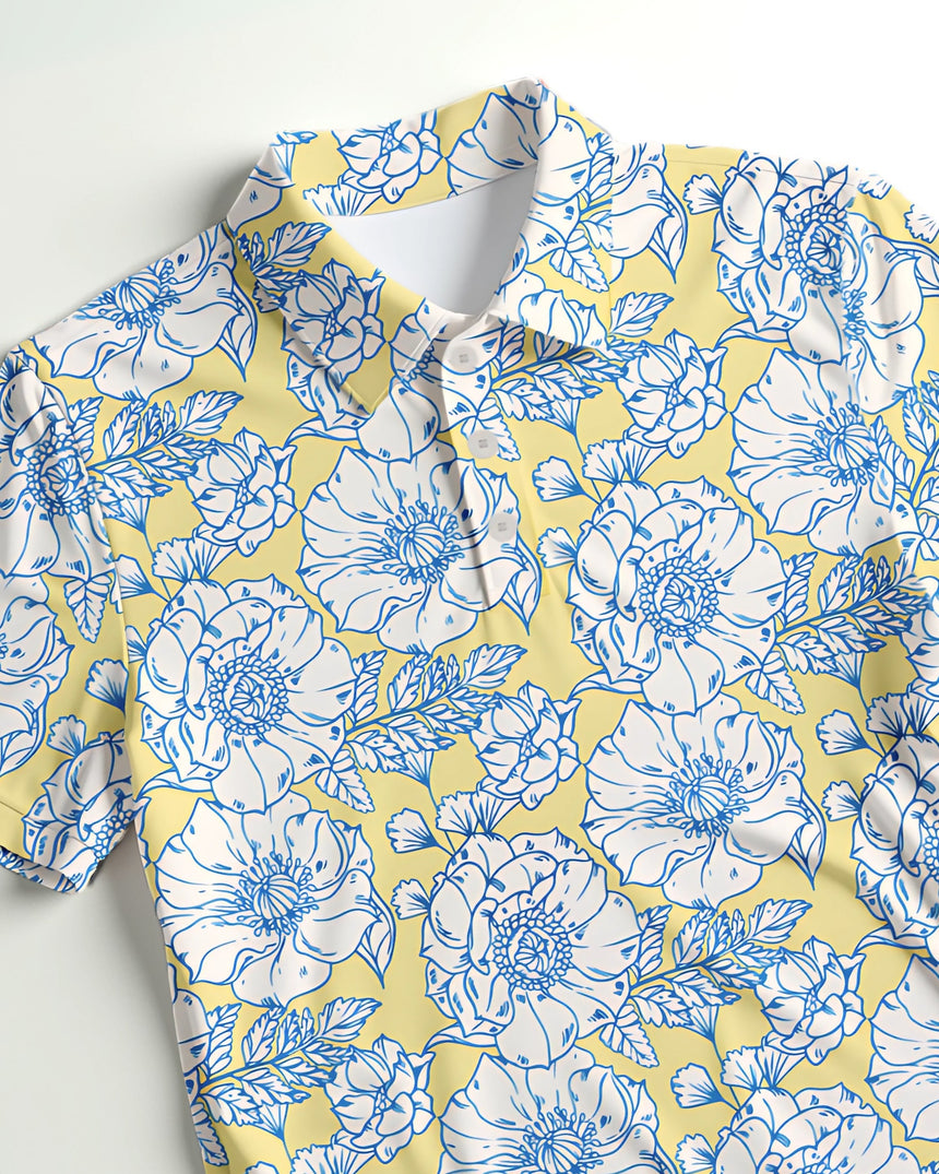 Yellow golf polo with blue floral pattern