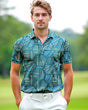Man wearing a geometric pattern teal golf shirt on a golf course