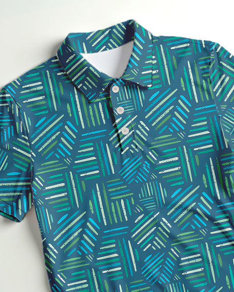 Close-up of a teal, green and blue geometric pattern golf polo