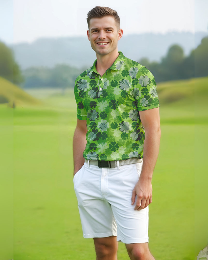 Man wearing a green lucky clover St Patricks Day polo golf shirt and white shorts standing on a golf course