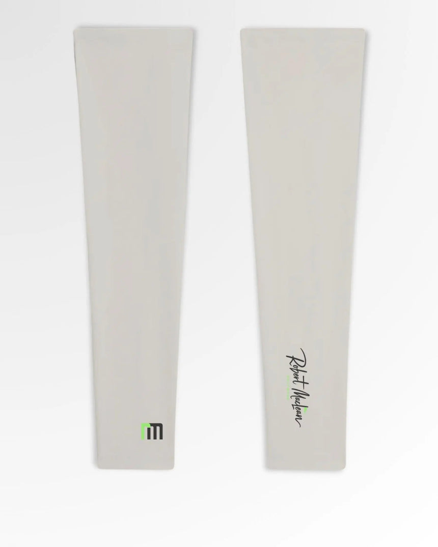 Golf polos in light grey with the brand logo and name.