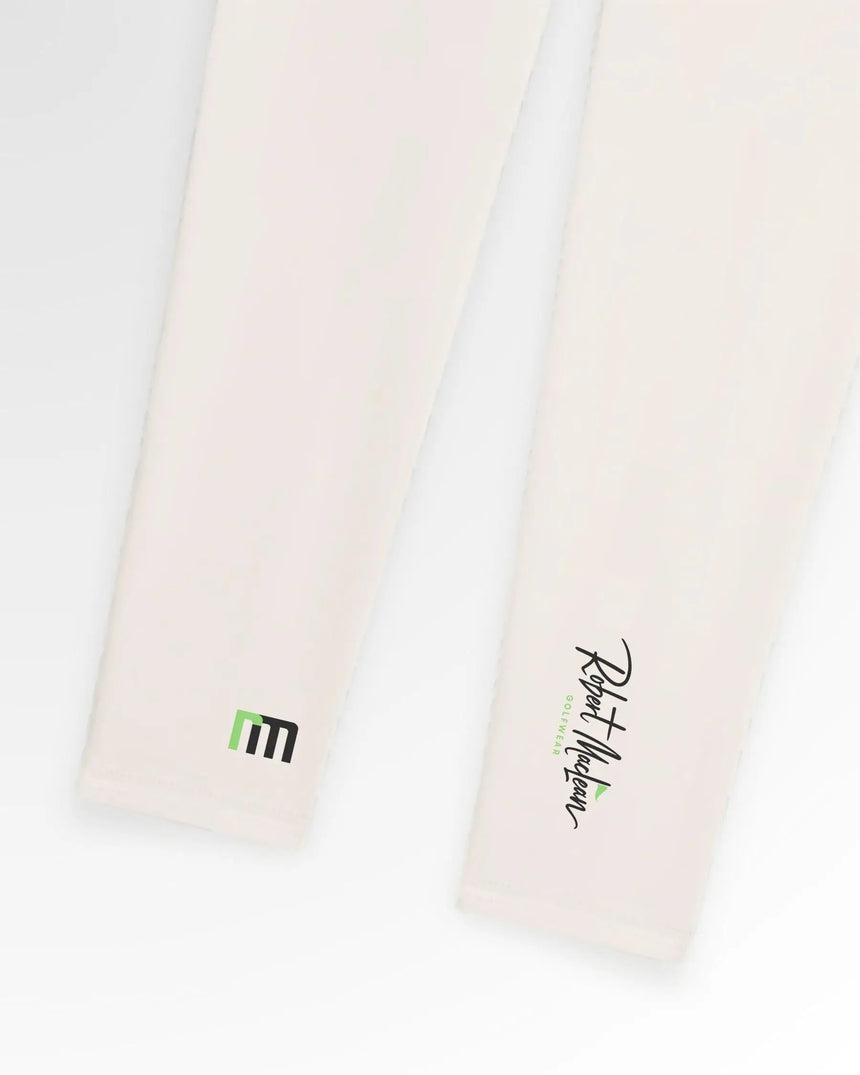 Close-up of Robert Maclean golf polos in white, showcasing the brand's logo.