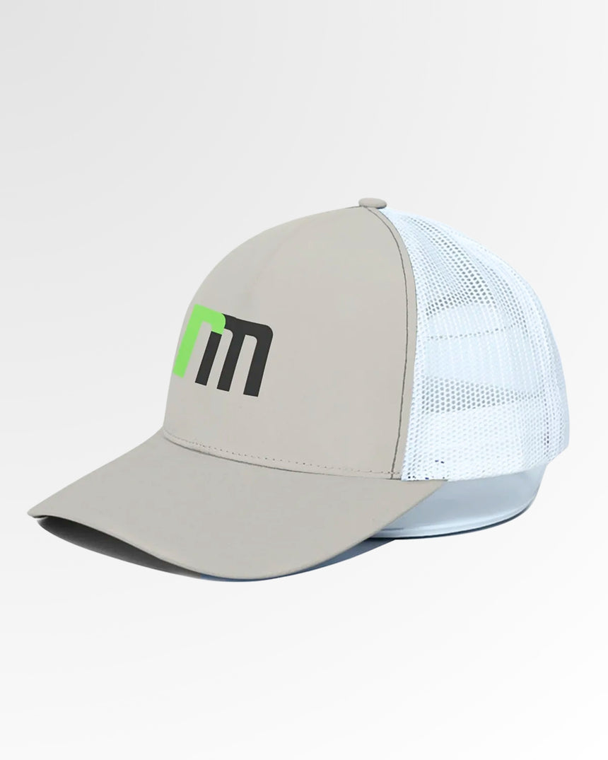 Golf wear brand hat, light brown with a white mesh back and a green and black logo.