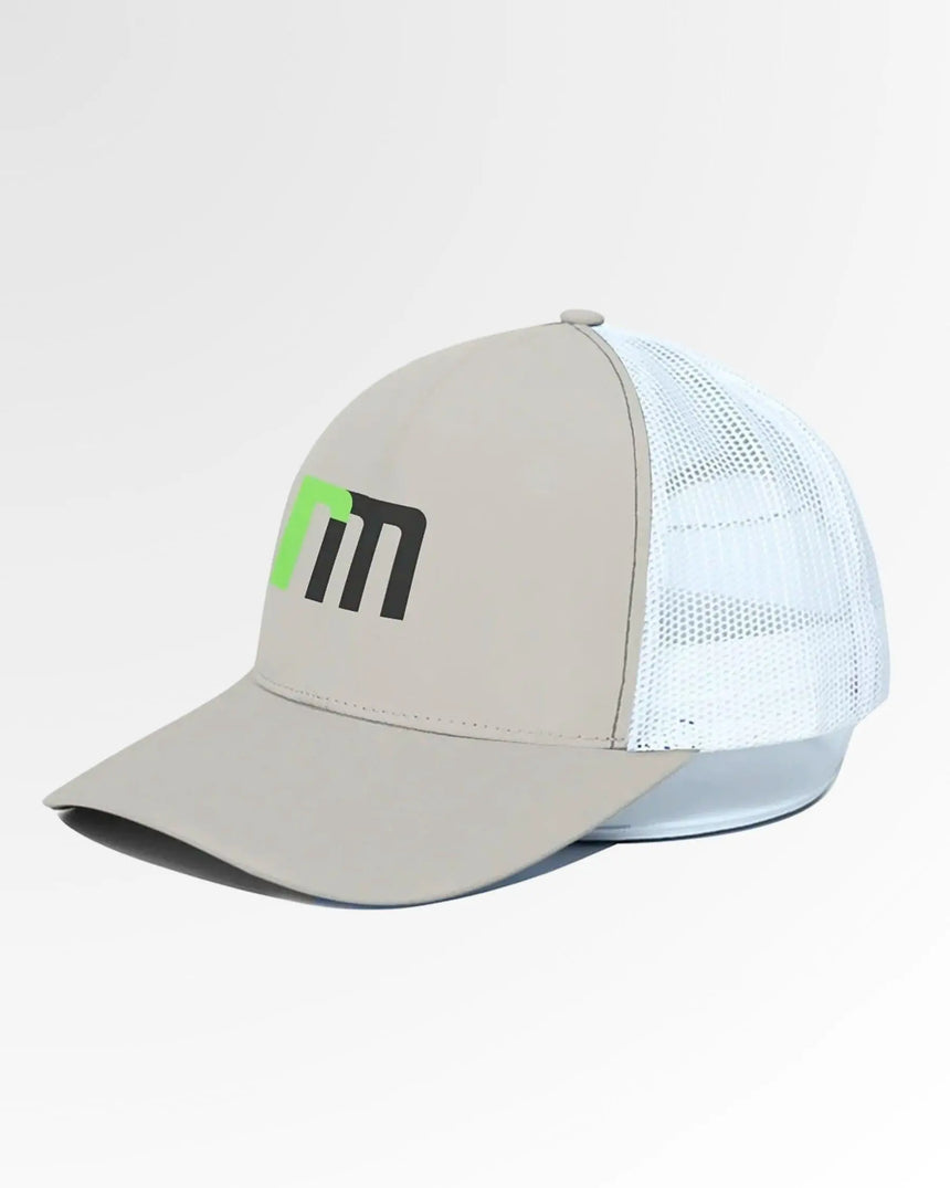 Golf wear brand hat, light brown with a white mesh back and a green and black logo.
