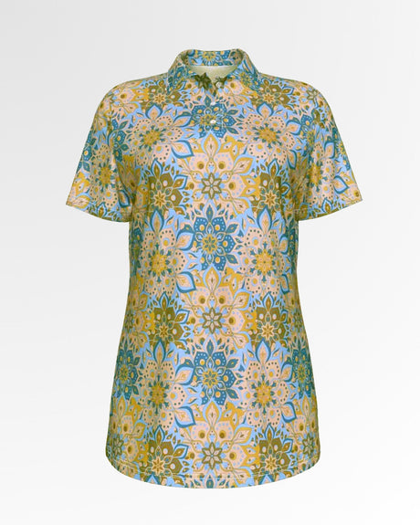 A golf polo shirt with a floral pattern in shades of blue, yellow, and green.