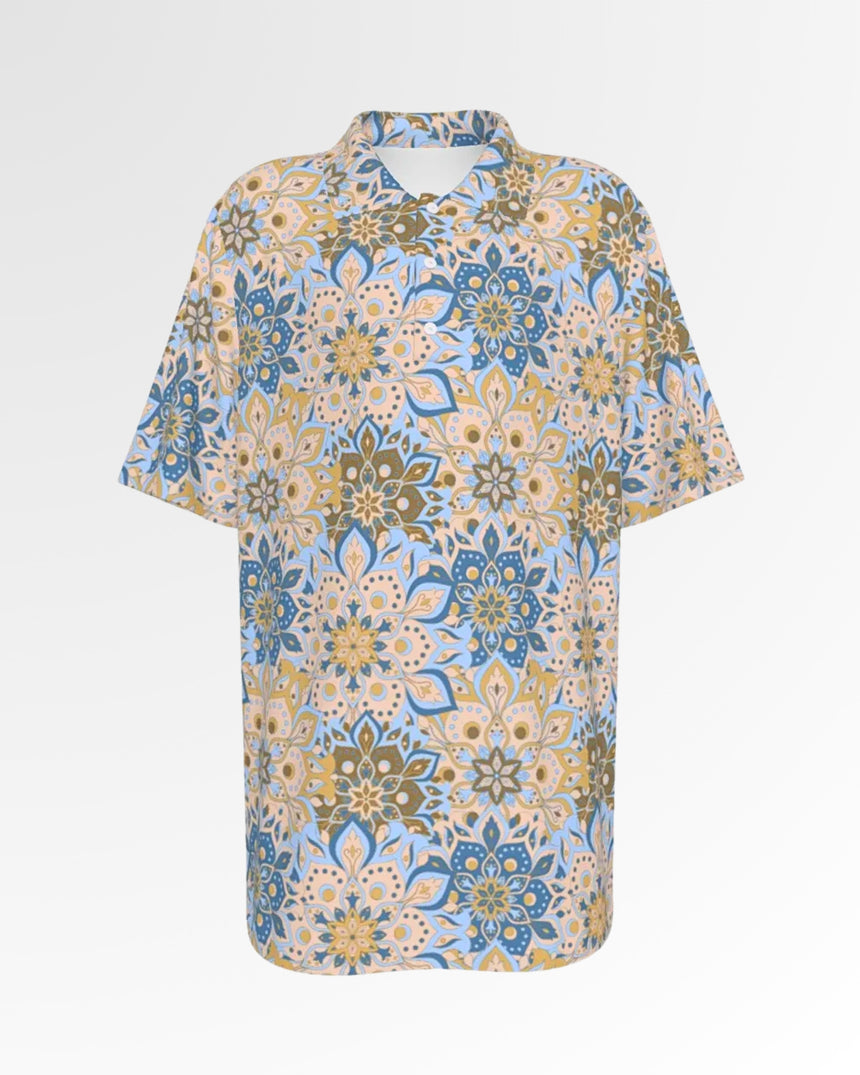 Golf polo shirt with a floral pattern in shades of blue, tan, and gold.