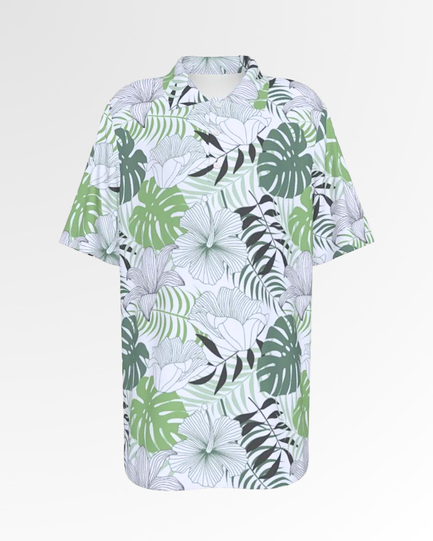 Golf polo featuring a tropical leaf and floral pattern.