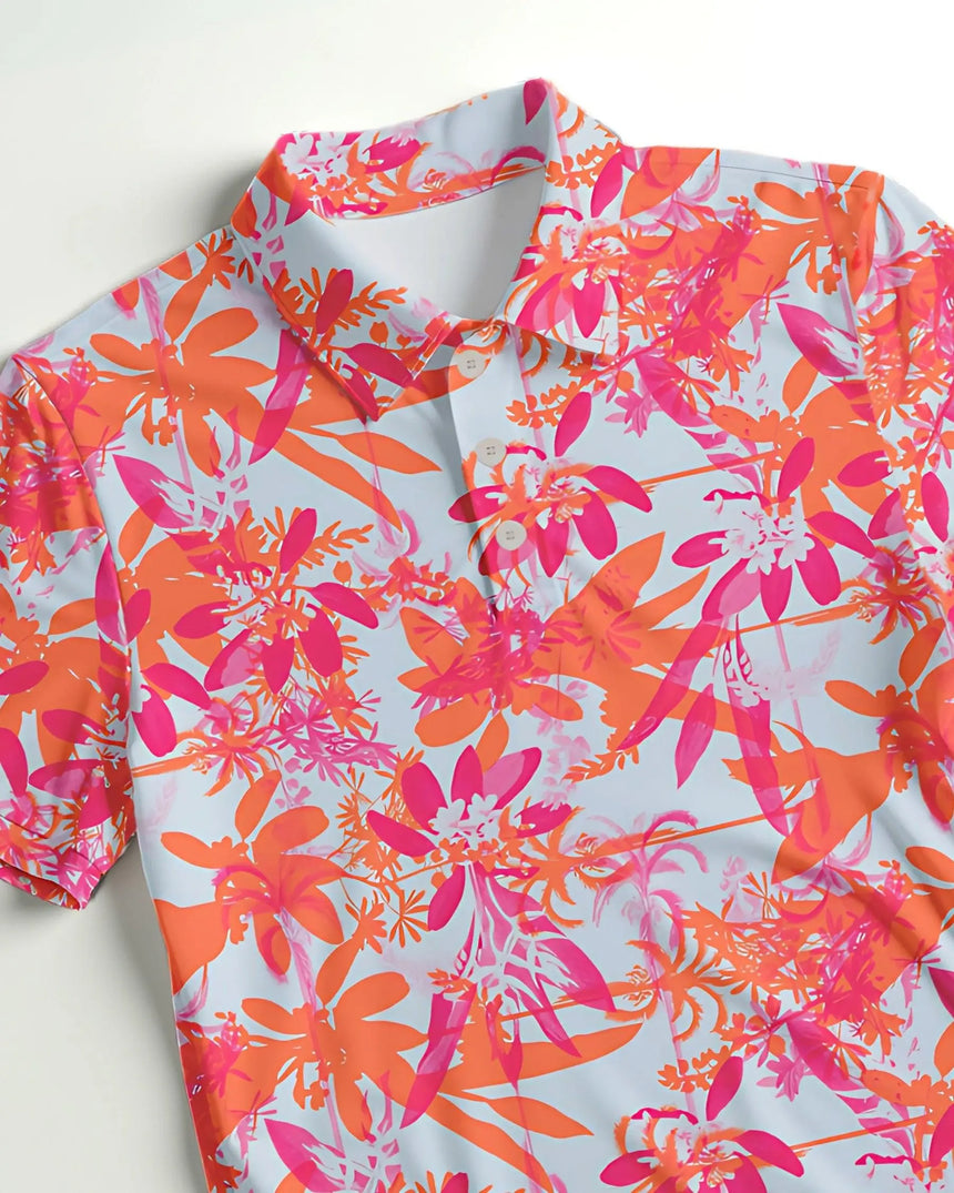 men's short sleeve golf polo in Hot Tropic print - fabric closeup front view