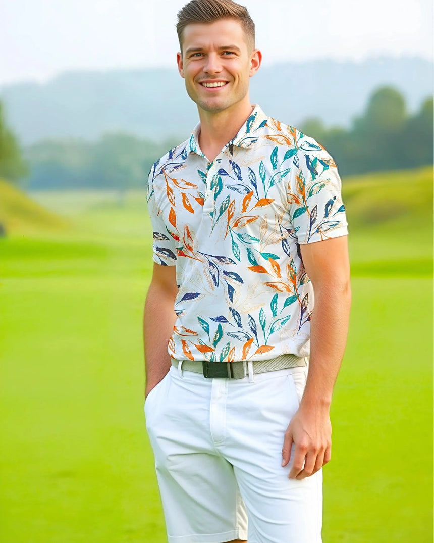 men's short sleeve golf polo in Leaf It On the Green print - model wearing on course