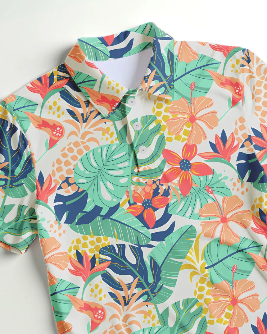 men's short sleeve golf polo in Tee Time Tropic print - fabric closeup front view