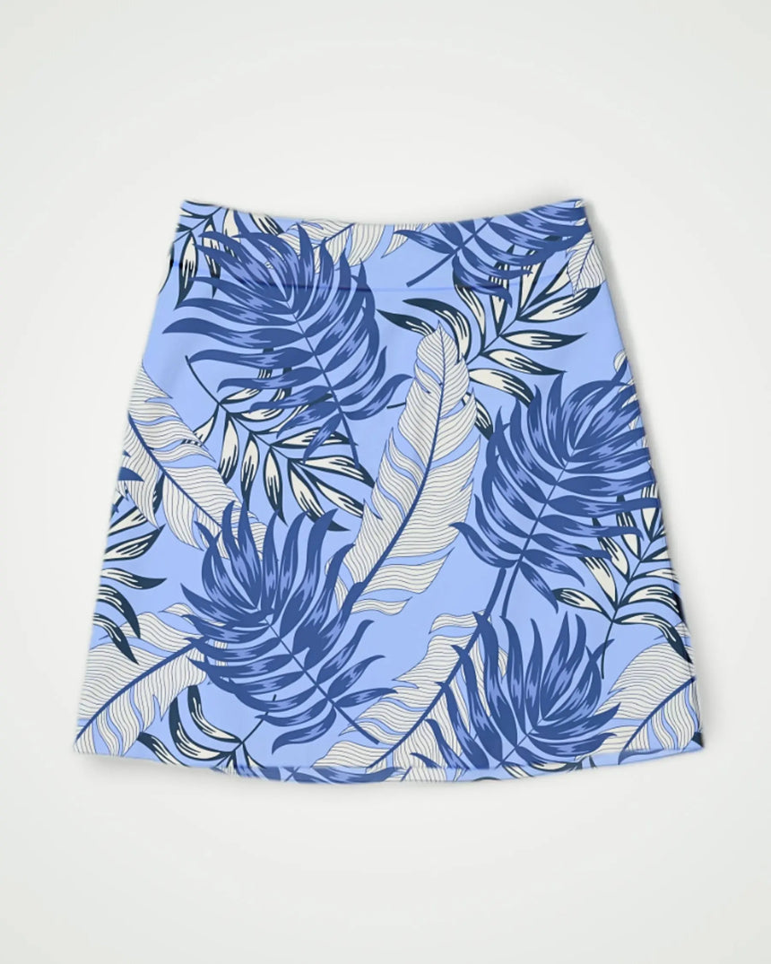 women's fitted golf skort with pockets in Blue Palms print - front view
