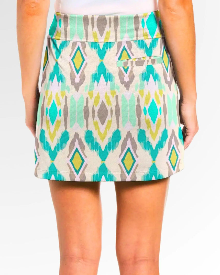 women's fitted golf skort with pockets in Par-tee Tribe print - back view
