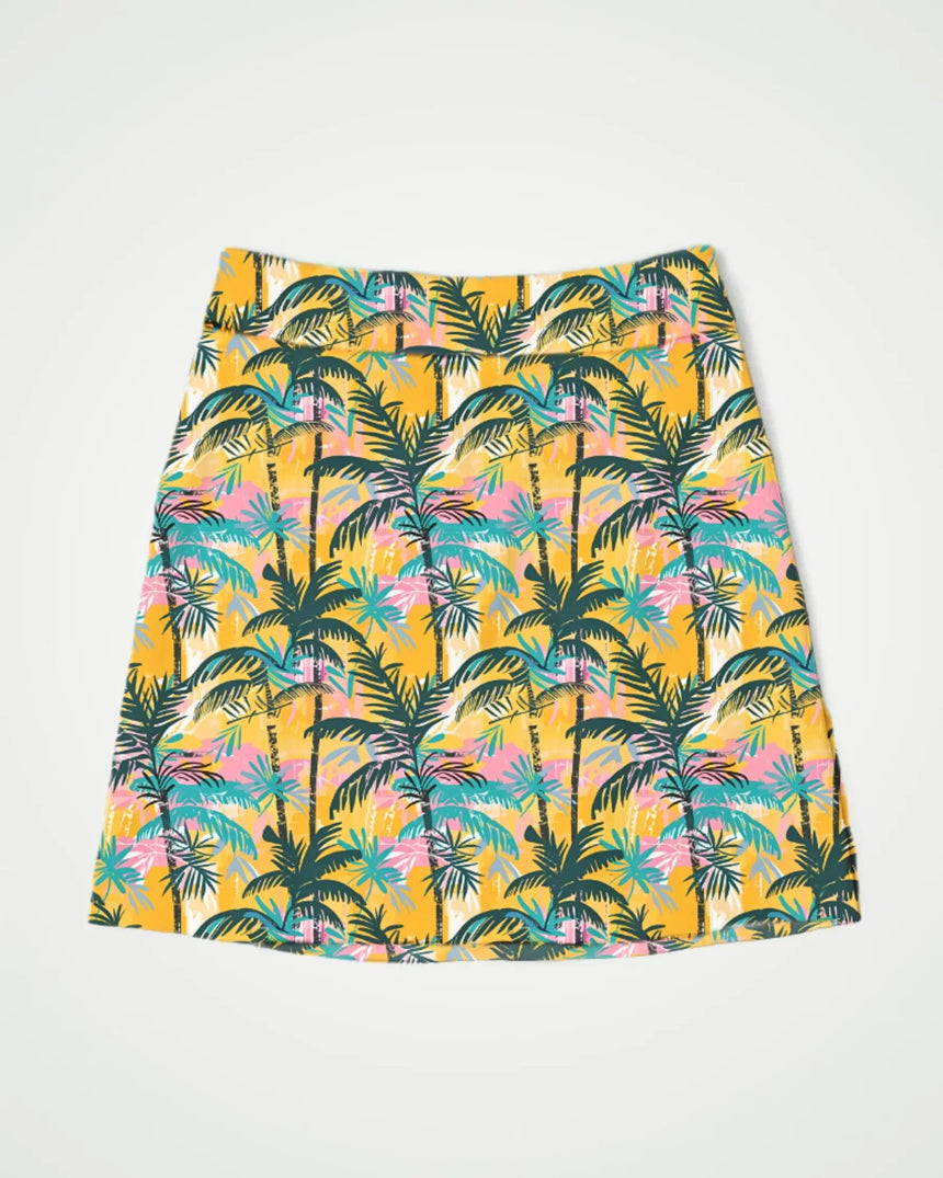 women's fitted golf skort with pockets in The Palms print - front view