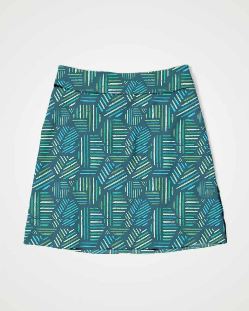 women's fitted golf skort with pockets in Wild Fairways print - front view