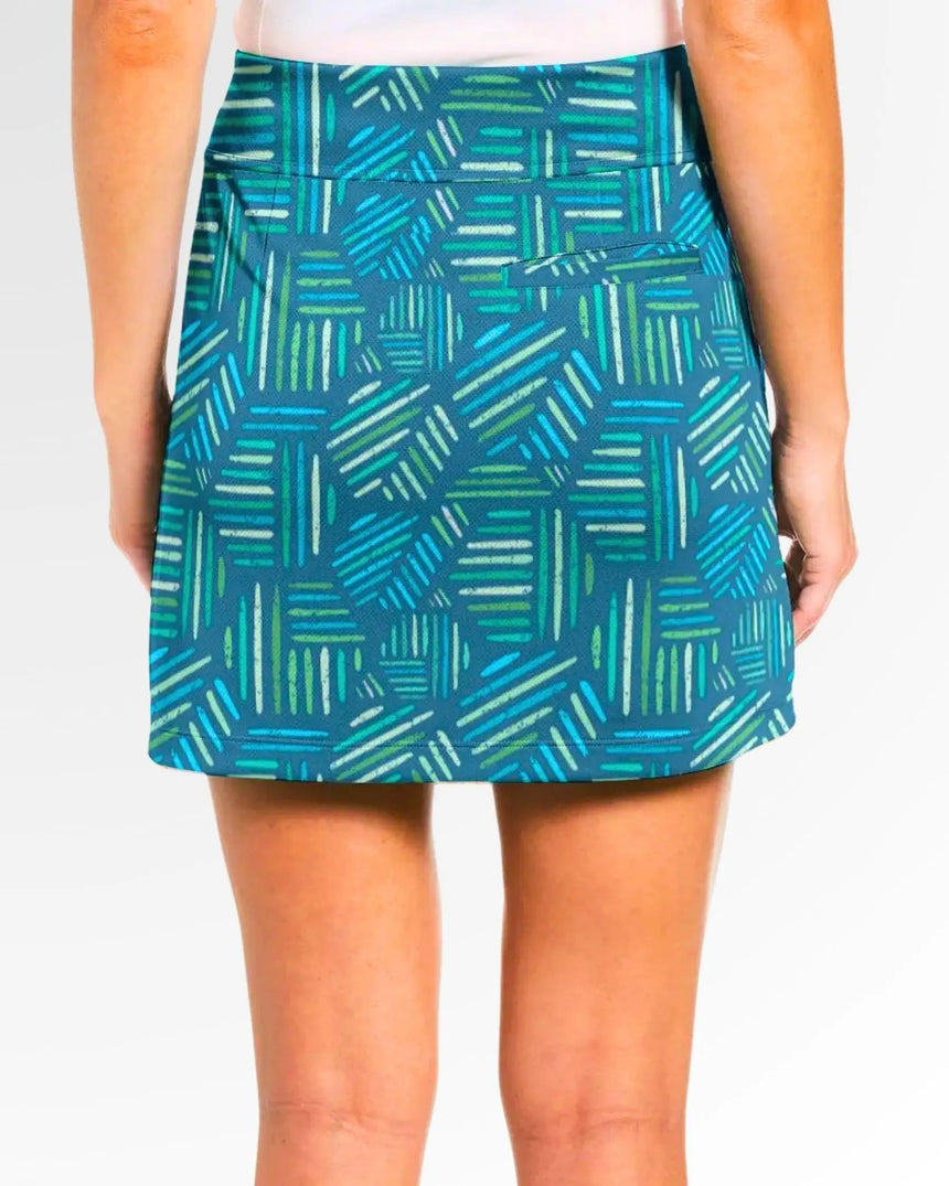 women's fitted golf skort with pockets in Wild Fairways print - back view