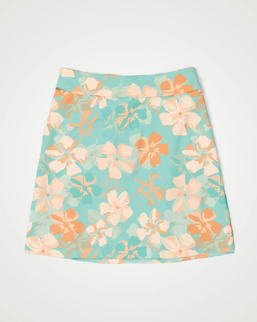 women's fitted golf skort with pockets in Zen Flora print - front view