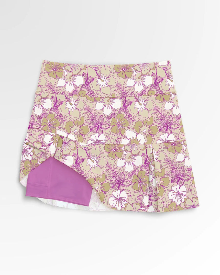women's pleated golf skort with pockets in Blossom Breeze print - front view