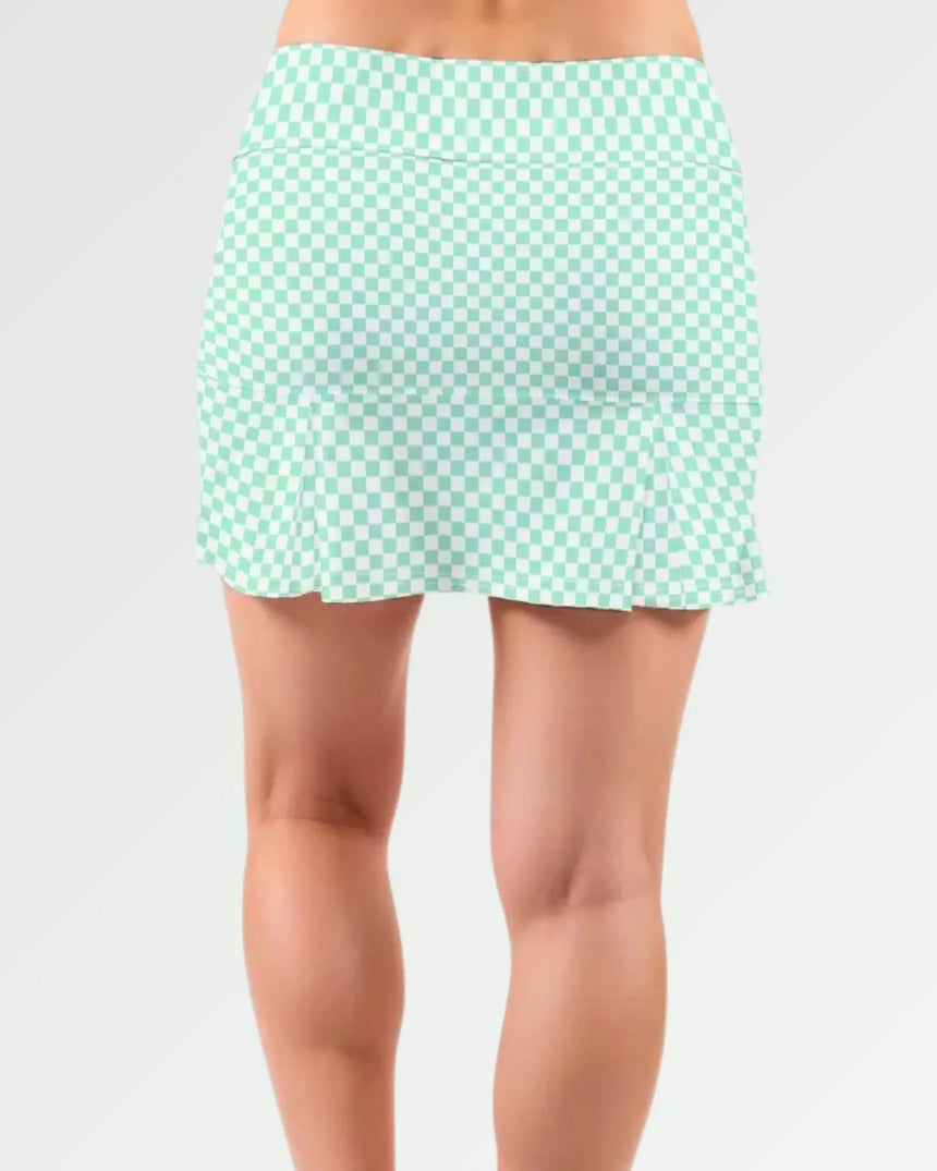 women's pleated golf skort with pockets in Checkered Greens print - back view