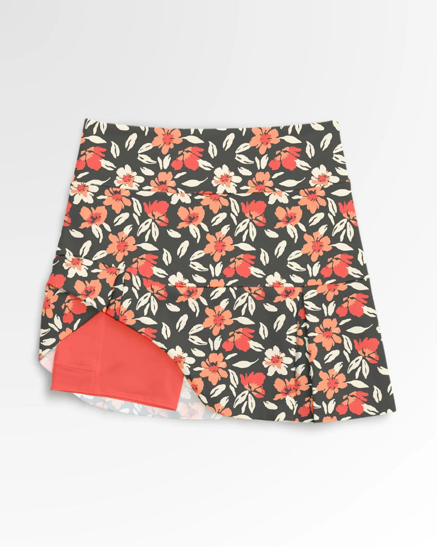 women's pleated golf skort with pockets in Coral Swing Floral print - front view
