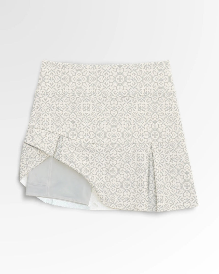 women's pleated golf skort with pockets in Eagle Elegance print - front view