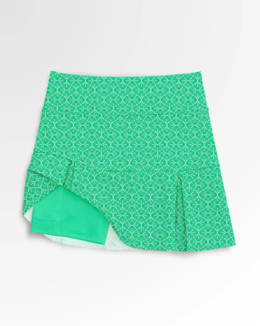 women's pleated golf skort with pockets in Fairway Fronds print - front view