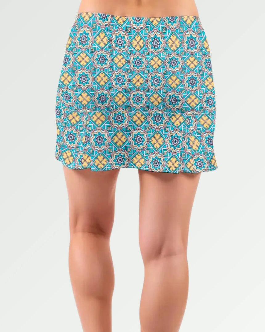 women's pleated golf skort with pockets in Sunset Swing print - back view