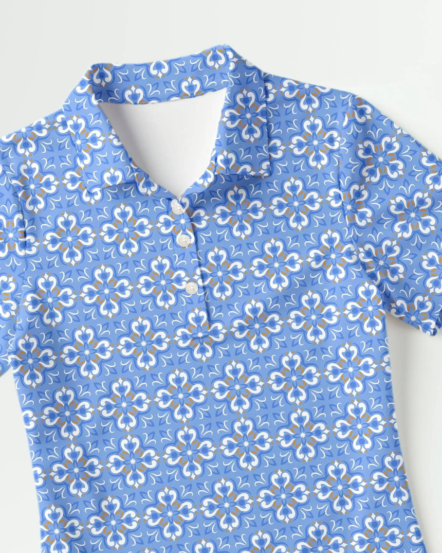 women's short sleeve golf polo in Blue Mosaic print - fabric closeup front view