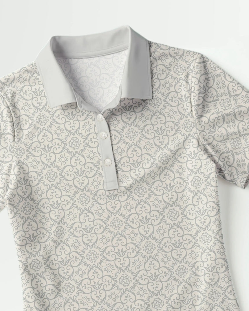 women's short sleeve golf polo in Eagle Elegance print - fabric closeup front view