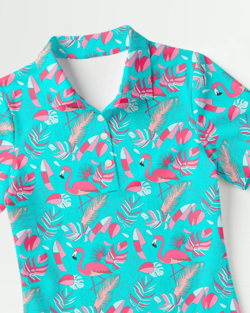 women's short sleeve golf polo in Fore the Flamingos print - fabric closeup front view