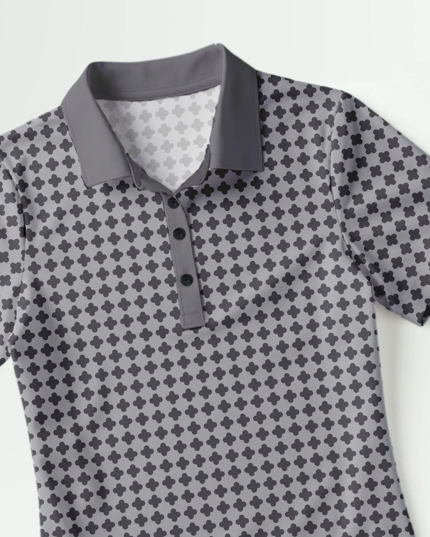 women's short sleeve golf polo in Golf Noir print - fabric closeup front view