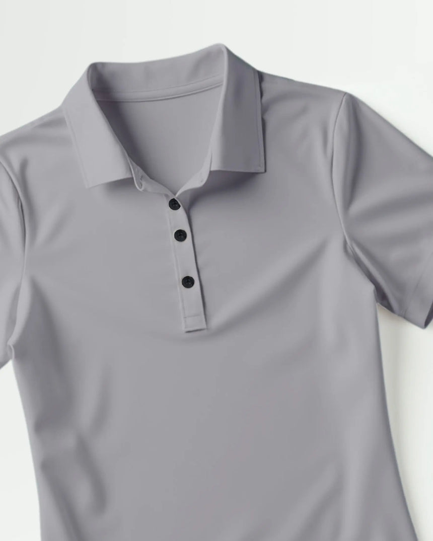 women's short sleeve golf polo in Golf Noir print - fabric closeup front view