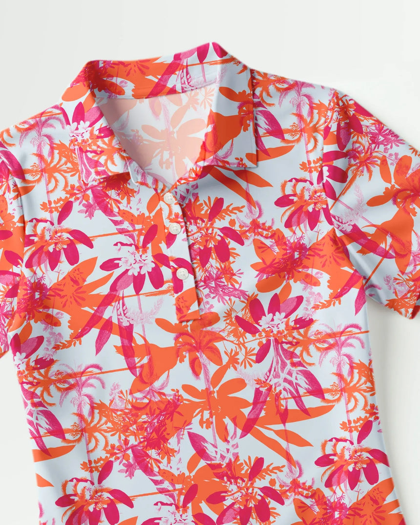 women's short sleeve golf polo in Hot Tropic print - fabric closeup front view