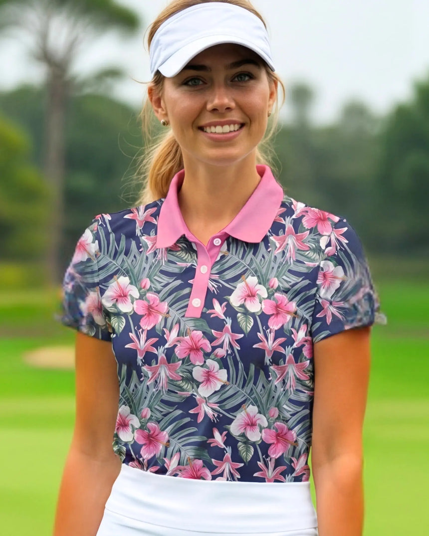 women's short sleeve golf polo in Midnight Blooms print - model wearing on course