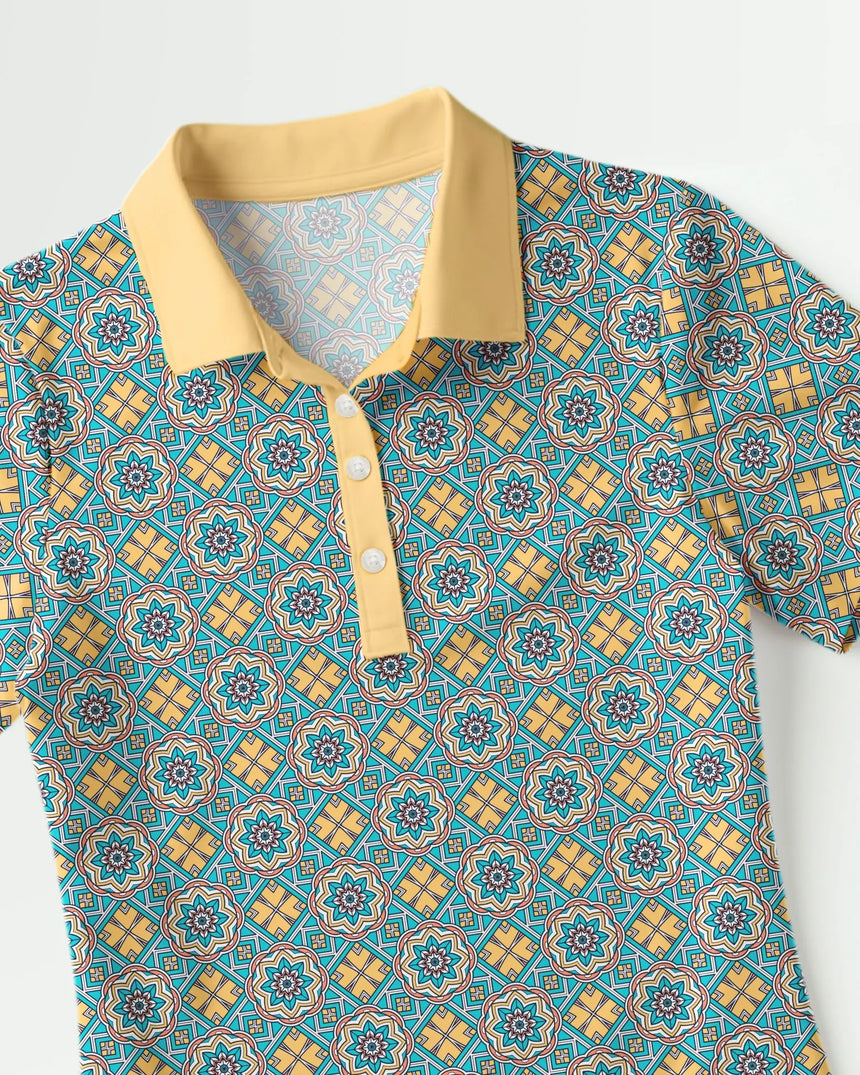 women's short sleeve golf polo in Sunset Swing print - fabric closeup front view