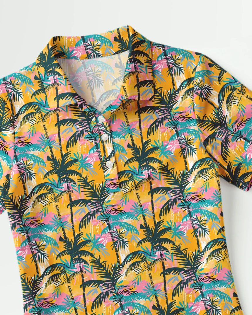 women's short sleeve golf polo in The Palms print - fabric closeup front view