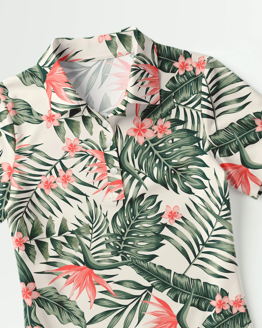women's short sleeve golf polo in Tropical Fare print - fabric closeup front view