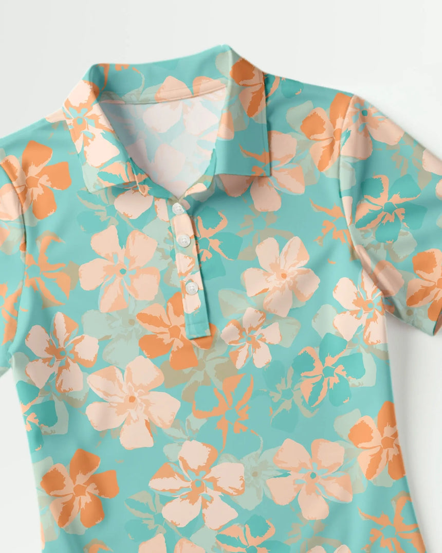 women's short sleeve golf polo in Zen Flora print - fabric closeup front view