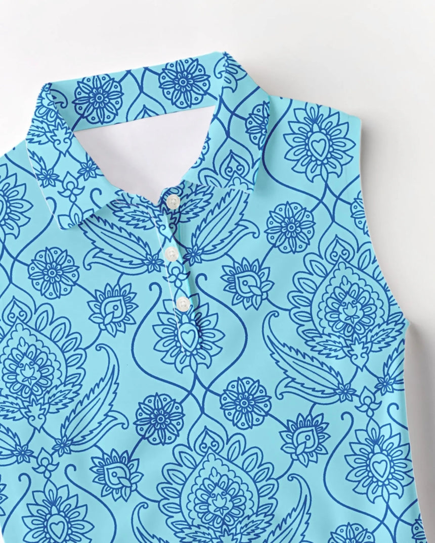 women's sleeveless golf polo in Fore de Fleur print - fabric closeup front view