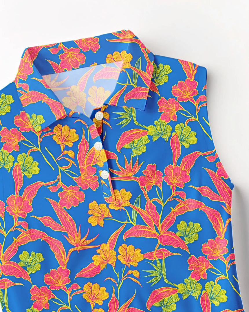 women's sleeveless golf polo in Paradise Found print - fabric closeup front view