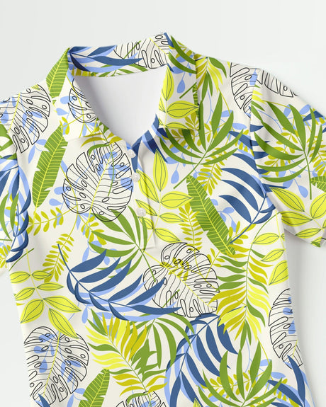 Hawaiian polo shirt with tropical leaf pattern on a white background