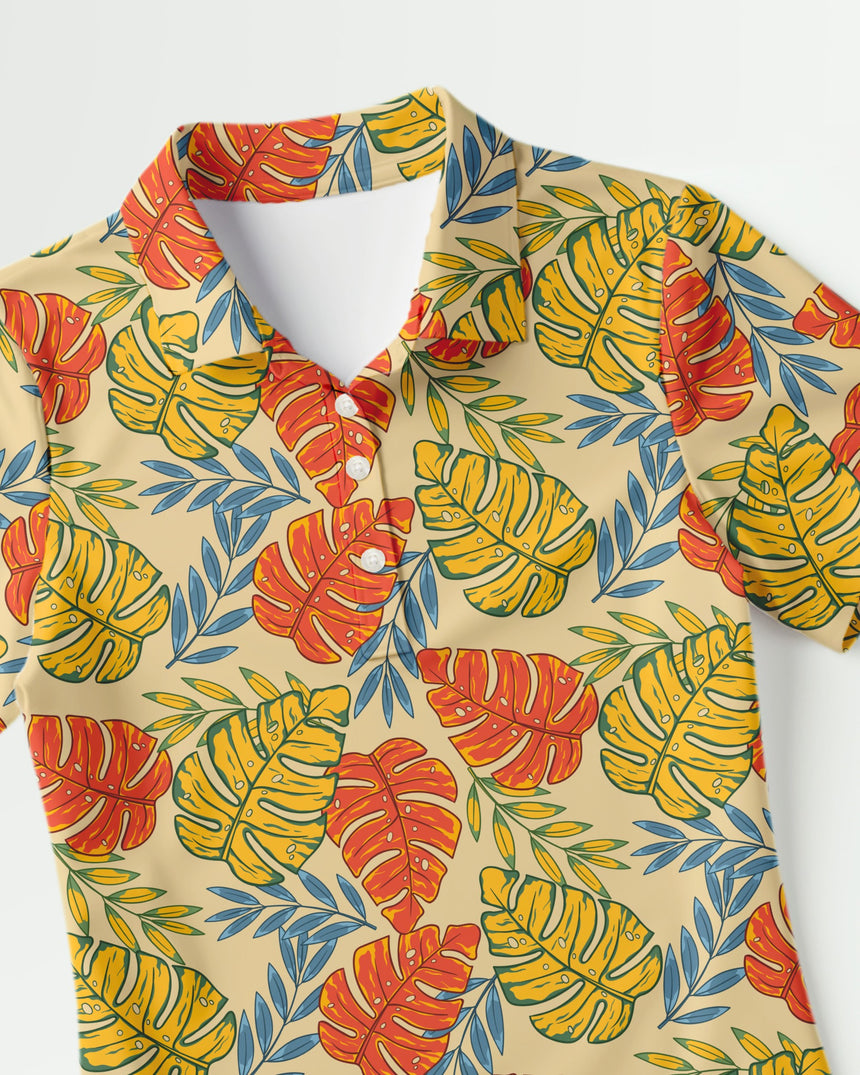 Colorful tropical leaf pattern shirt on a beige background